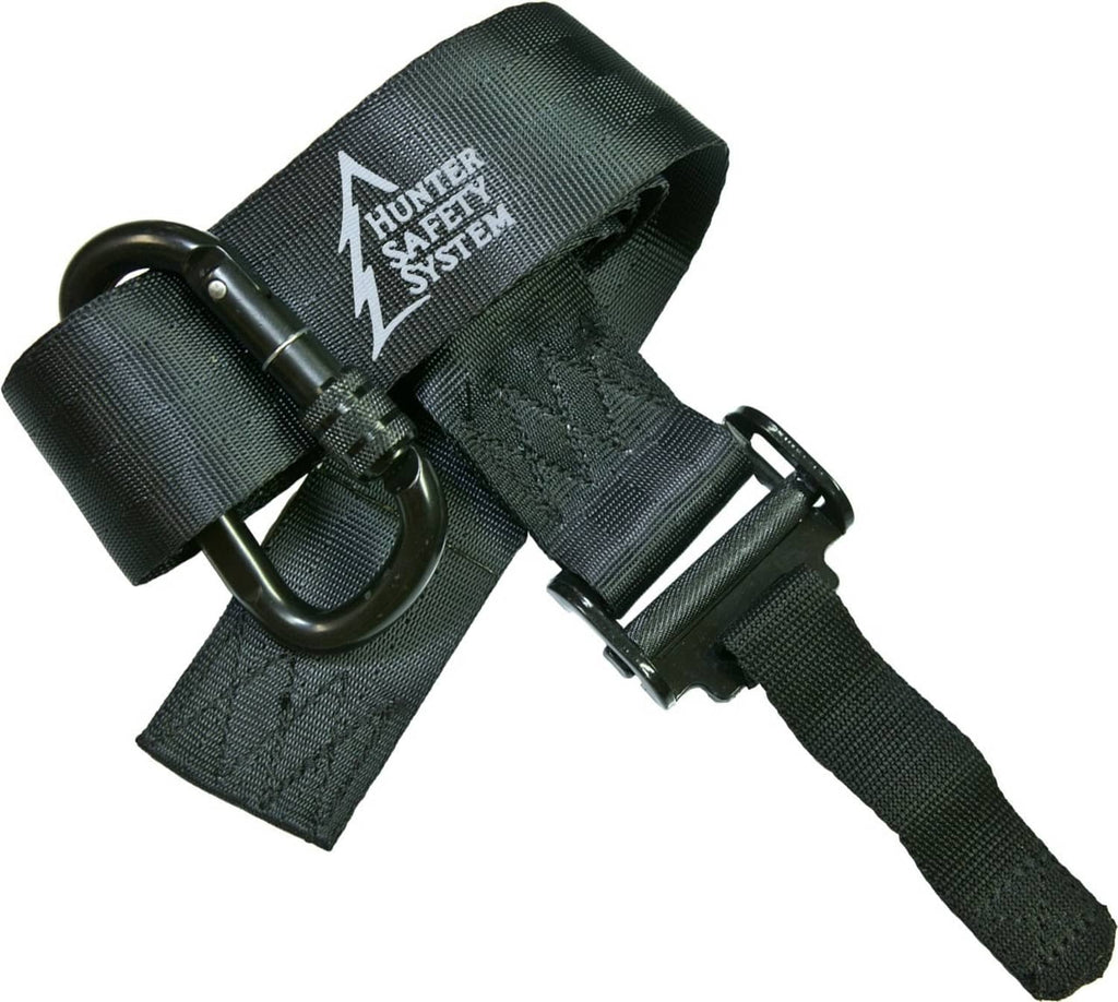 Dark green tree strap with Hunter Safety System patch and metal rings, flat view
