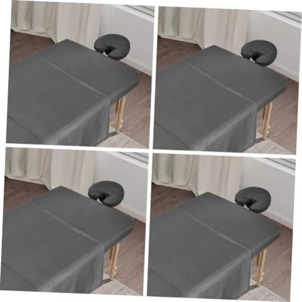 Grey massage table sheet set draped over table with matching headrest pillow cover
