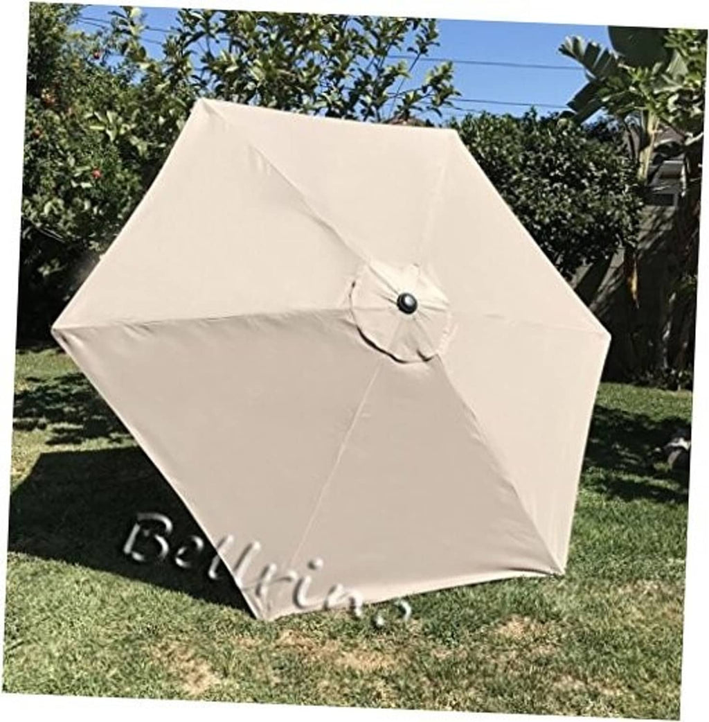 Off-white umbrella canopy with central button and stitched vent seam, patio replacement cover