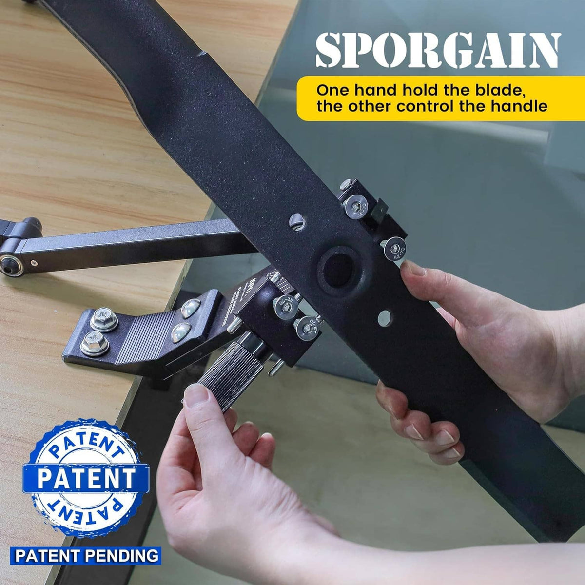 Lawn mower blade sharpener and balancer tool with hands adjusting a mower blade