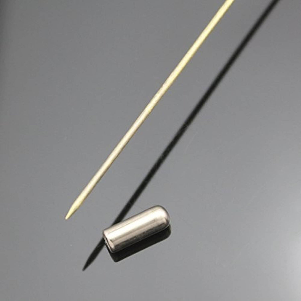 Gold-tone hatpin stem tip with cylindrical needle guard