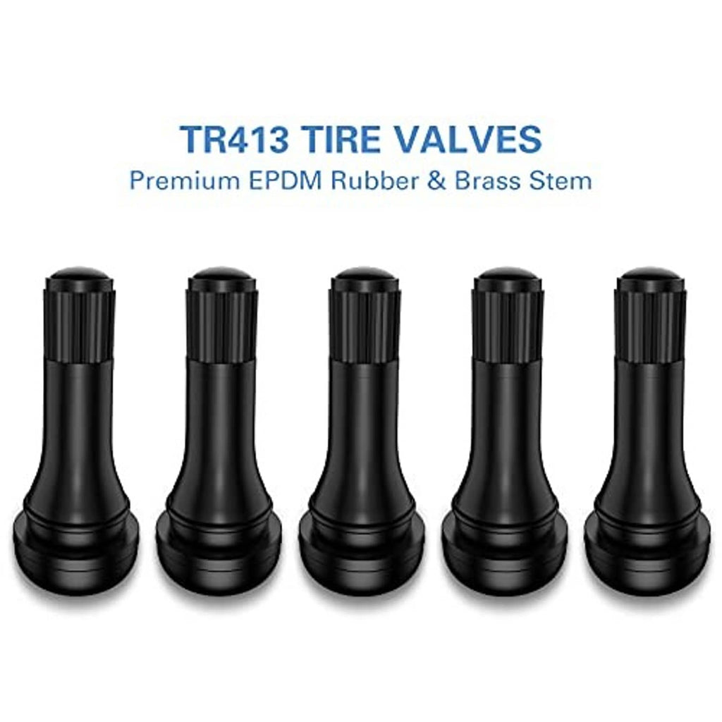 Five black rubber tire valve stems with ridged caps, lined up