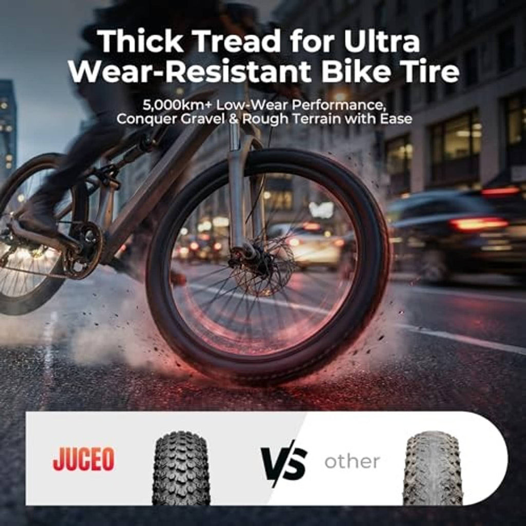 Black knobby bike tire with thick tread mounted on wheel