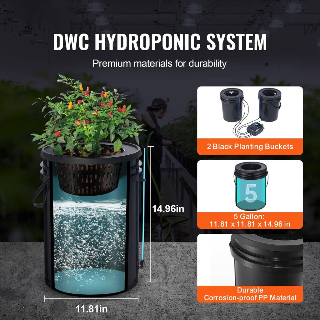 Two black planting buckets with pump and blue air tubes for hydroponic growth