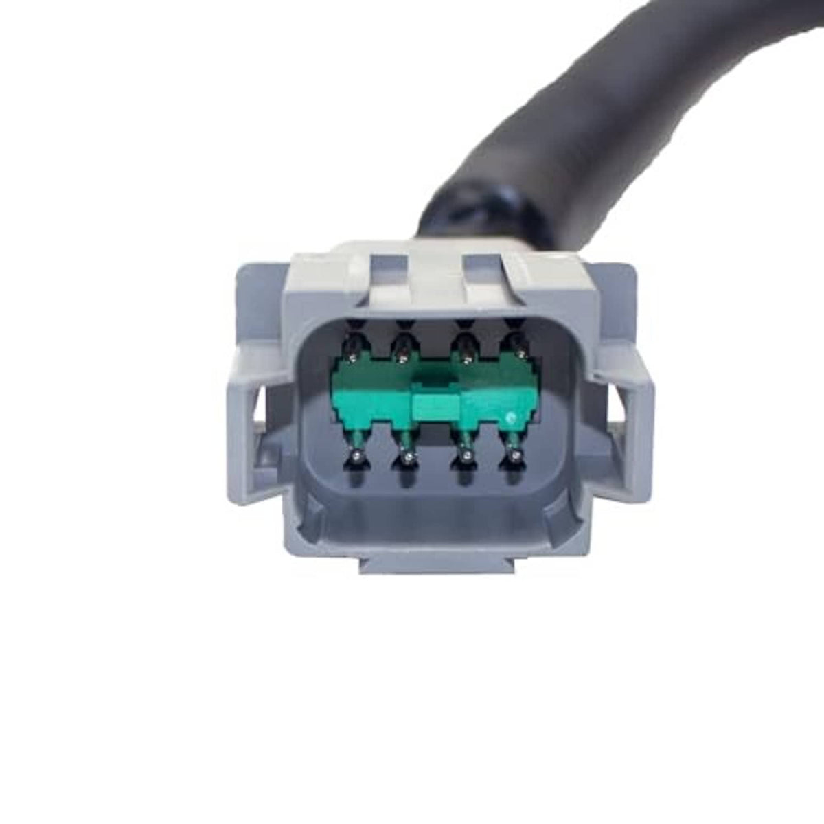 Gray electrical connector housing with green terminal pins for headlight harness