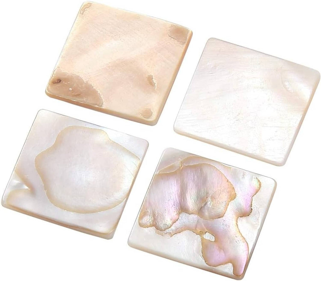 Square mother-of-pearl mosaic tiles in beige and pearl white tones