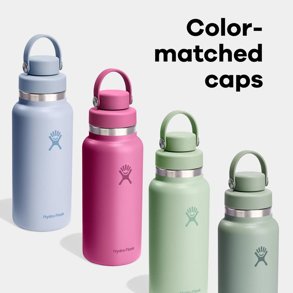 Color-matched insulated stainless steel water bottles with different cap colors, grouped view.