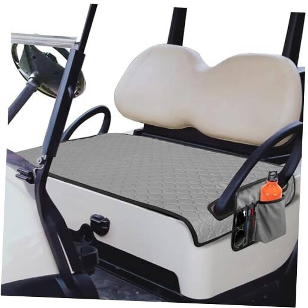 Grey patterned golf cart seat towel blanket with fitted straps on a bench seat