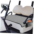 Grey patterned golf cart seat towel blanket with fitted straps on a bench seat