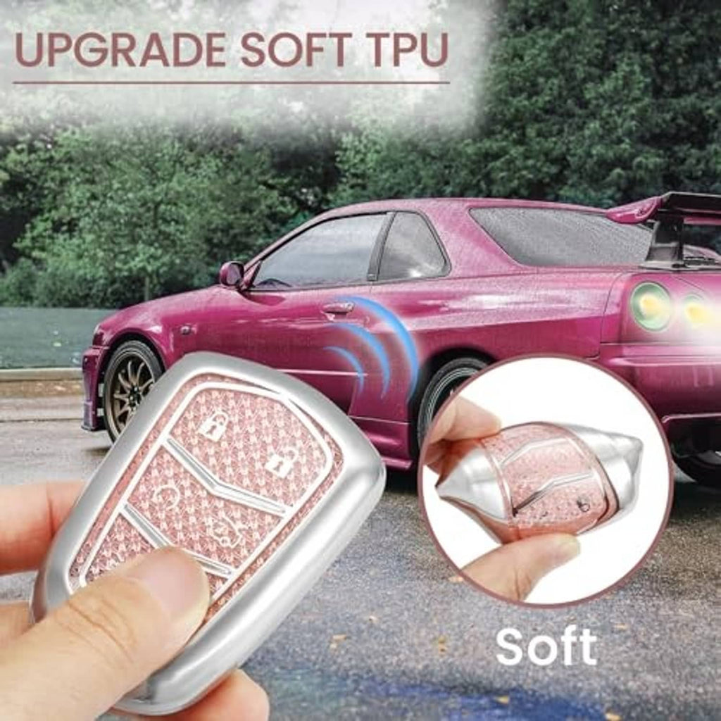 Pink glitter soft TPU key fob cover held in hand with silver bumper edge