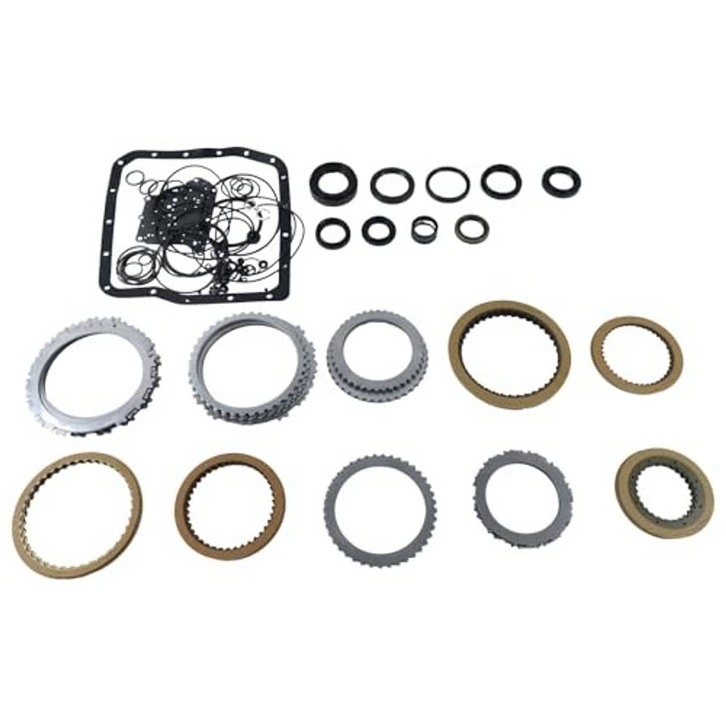 Transmission rebuild kit parts laid out: gasket, O-rings, and friction plate rings