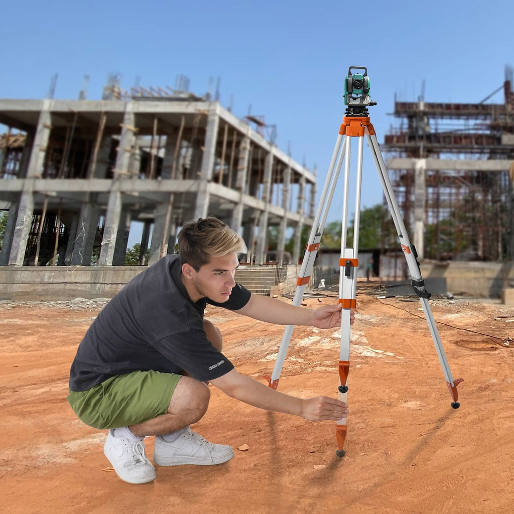 Laser level tripod stand with orange top and silver tripod legs in working position.