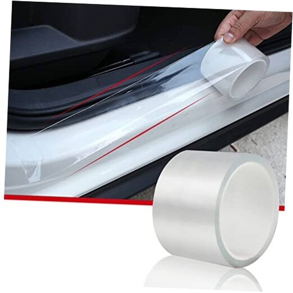 Clear car door edge protector film applied along the door sill edge with hand visible