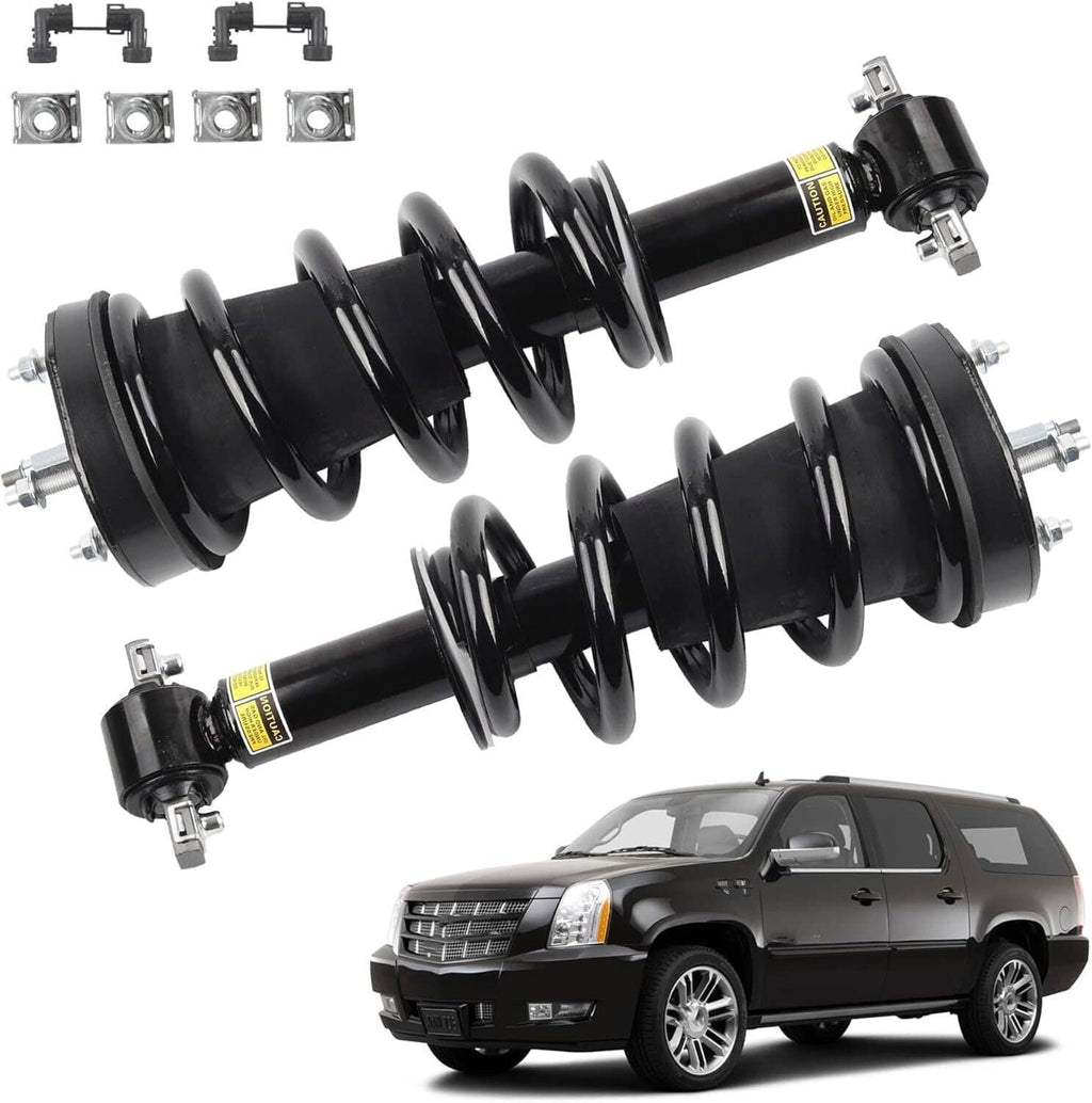Front shock strut pair installed on vehicle, black coil springs with mounts
