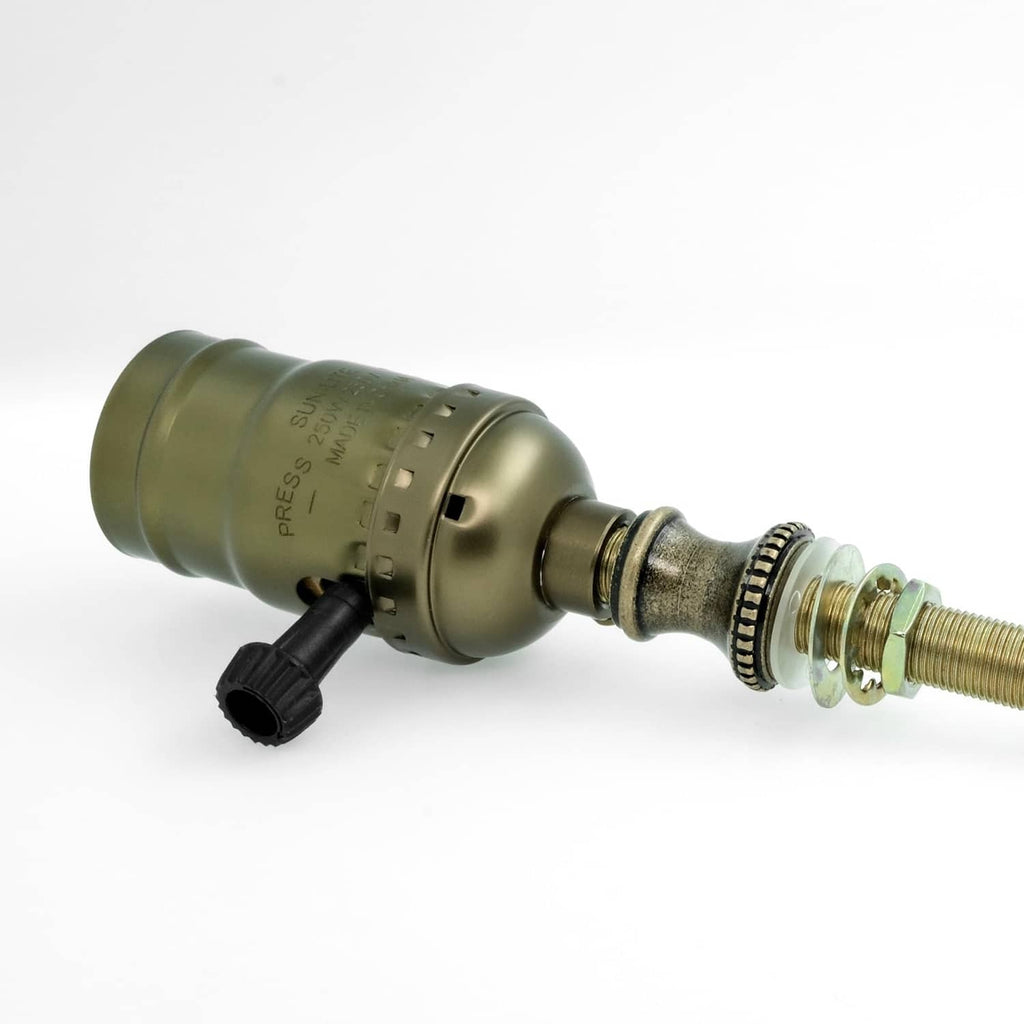 Lamp cord strain relief with bronze housing, threaded connector, and black electrical plug