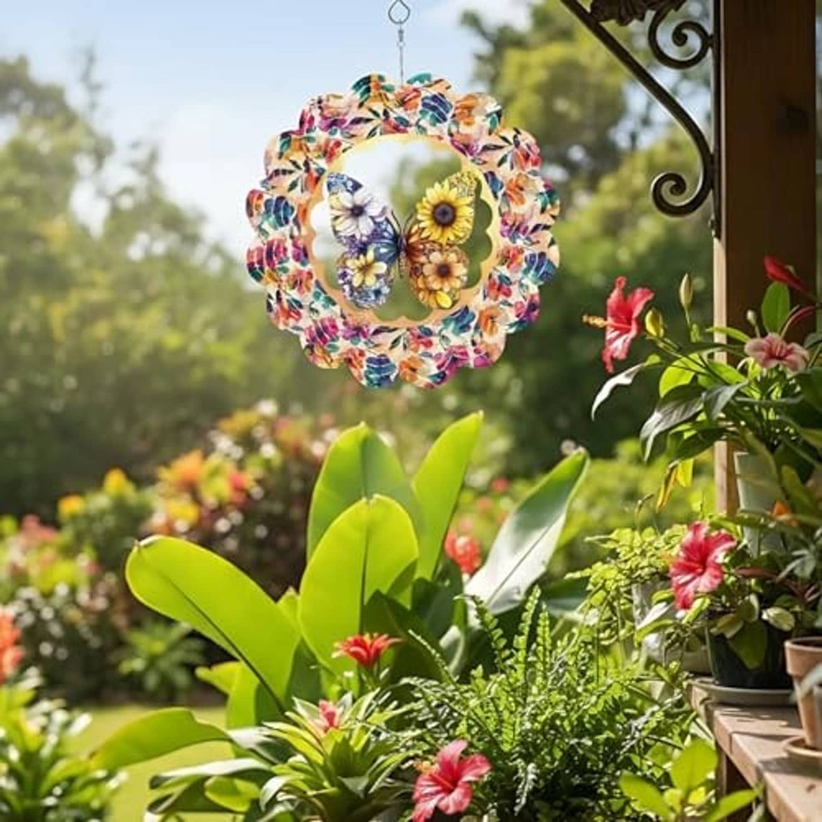 Colorful butterfly-and-flower 3D kinetic wind spinner hanging outdoors