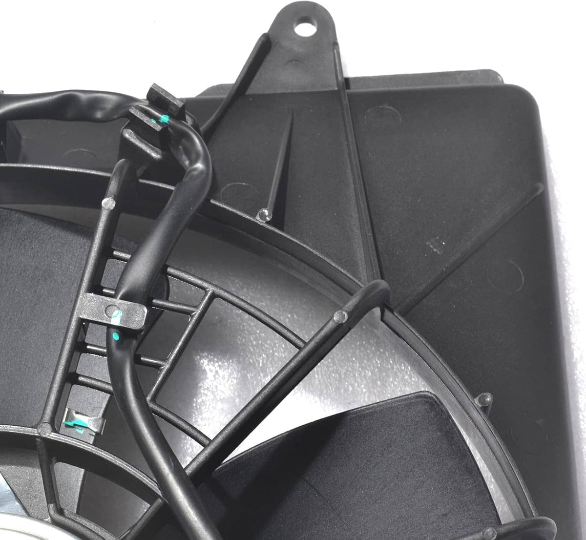 Fan shroud and mounting hardware with black hoses and connector brackets