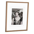 Walnut wood picture frame with white mat and clear glass, front view