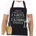 Black grilling apron with front text, adjustable neck strap, and two front pockets