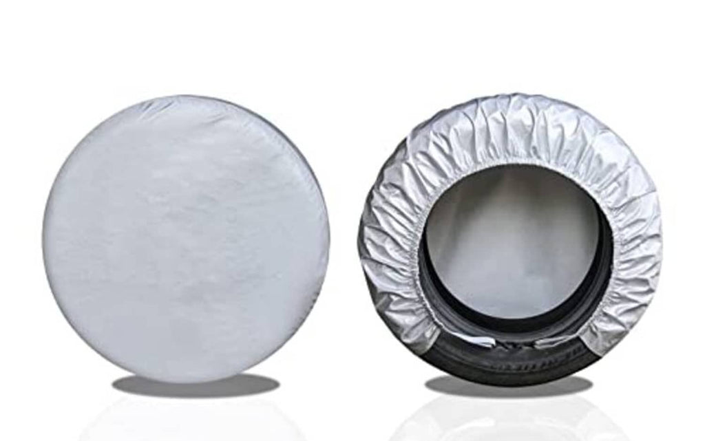 Silver RV tire cover pair, front and side views with center cutout opening
