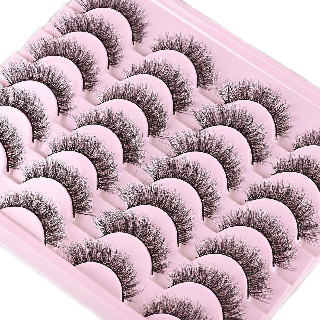 Angled close-up tray with stacked natural short wispy false mink lashes