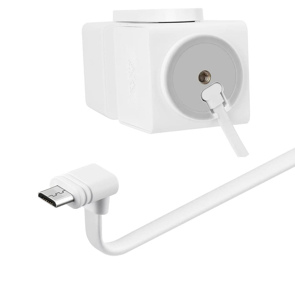 White micro USB power cable connected to a security camera power port