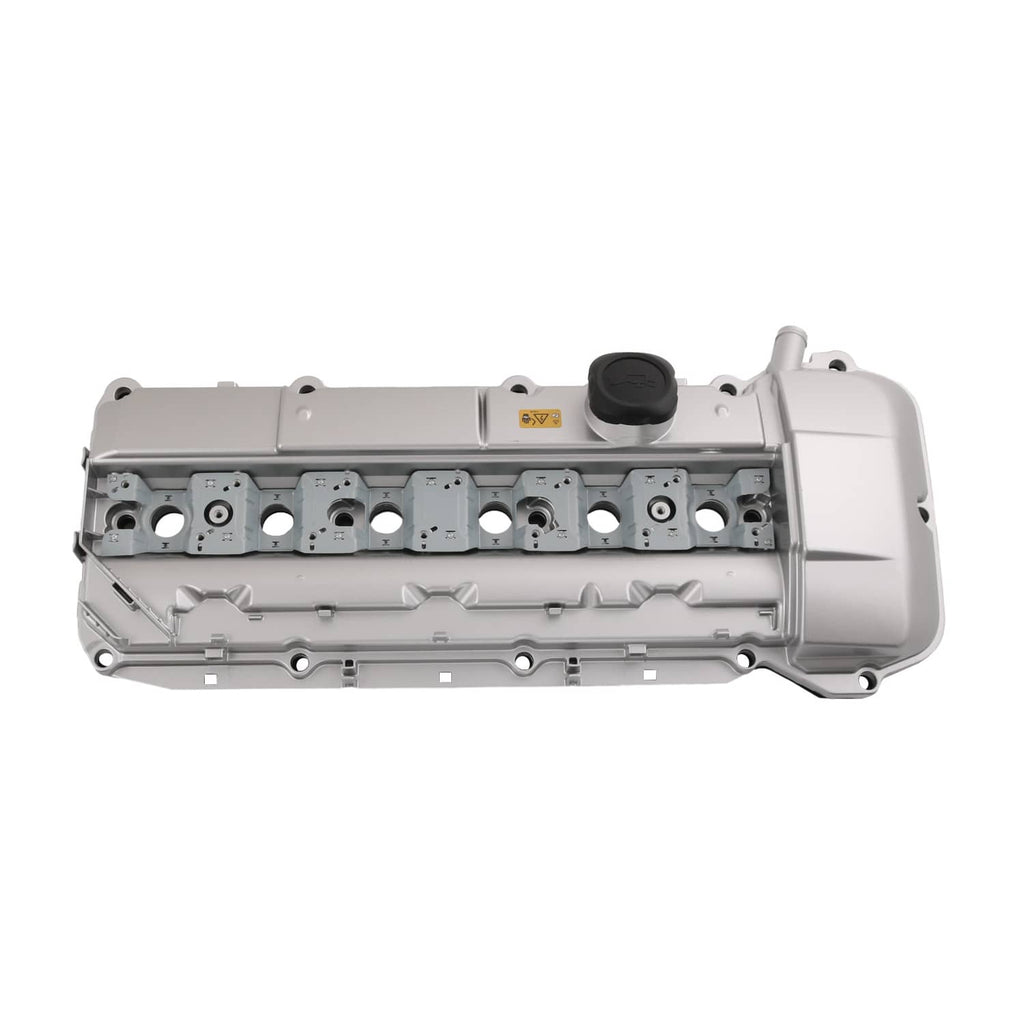 Aluminum valve cover in light gray with rocker-area cutouts and side outlet tube