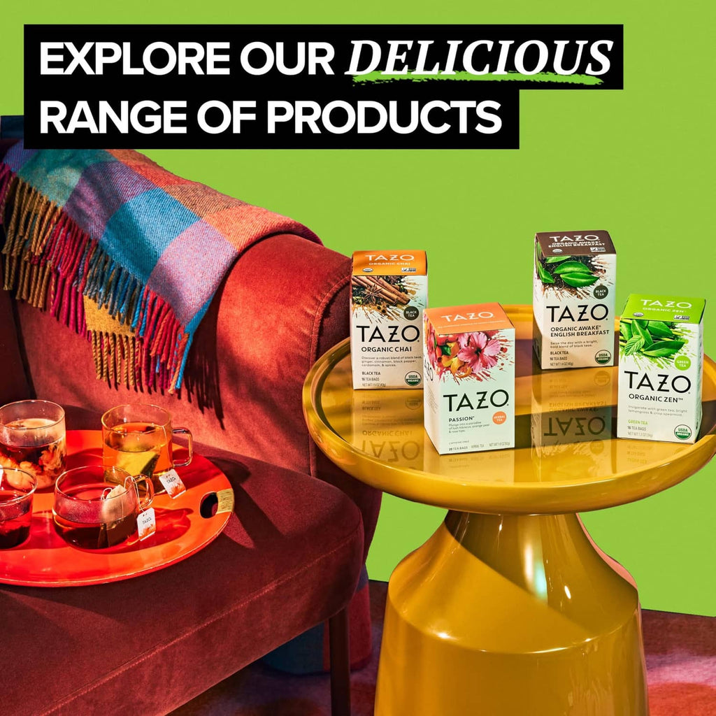 TAZO green tea variety boxes displayed on a stand