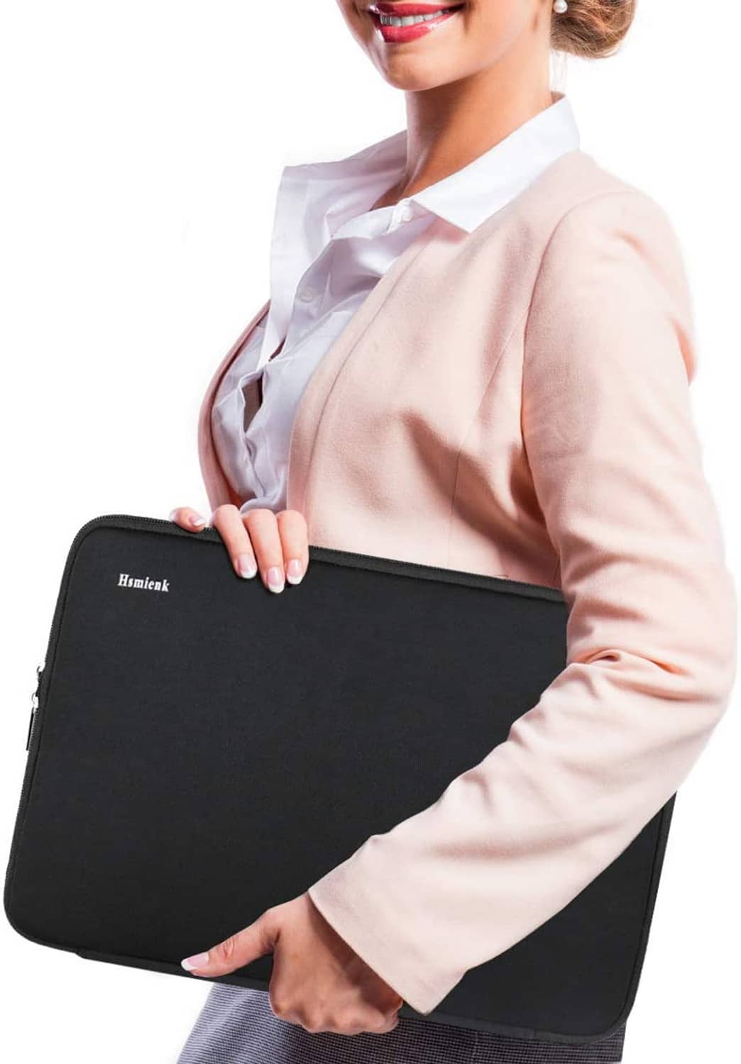 Black laptop sleeve held by person, slim profile with zipper and padded edge.