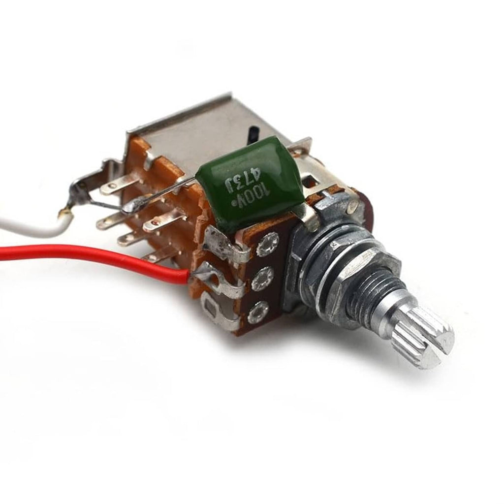 Guitar harness potentiometer assembly with green cap, solder tabs, and attached wires