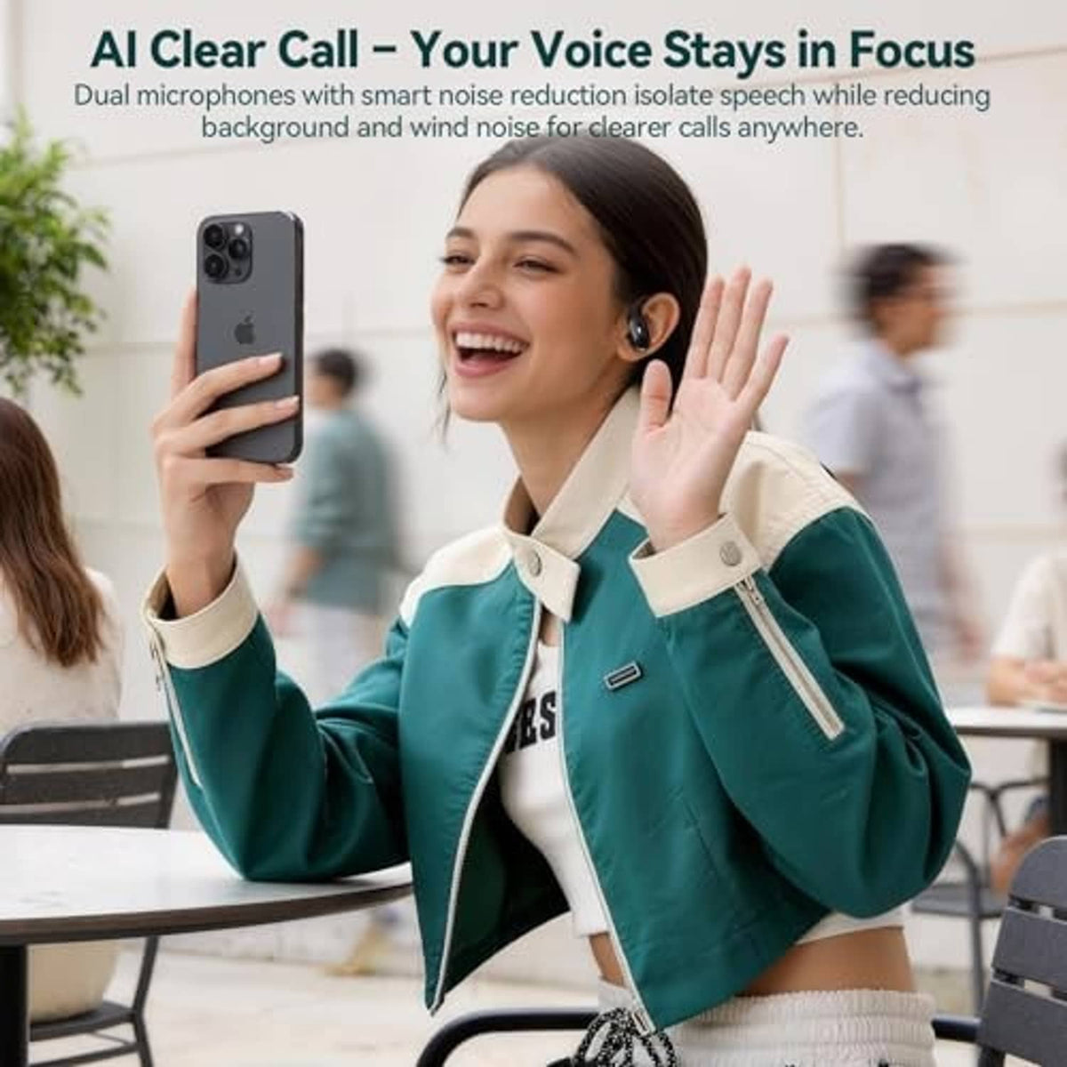 Wireless in-ear earbuds worn by a smiling person, black earbuds visible
