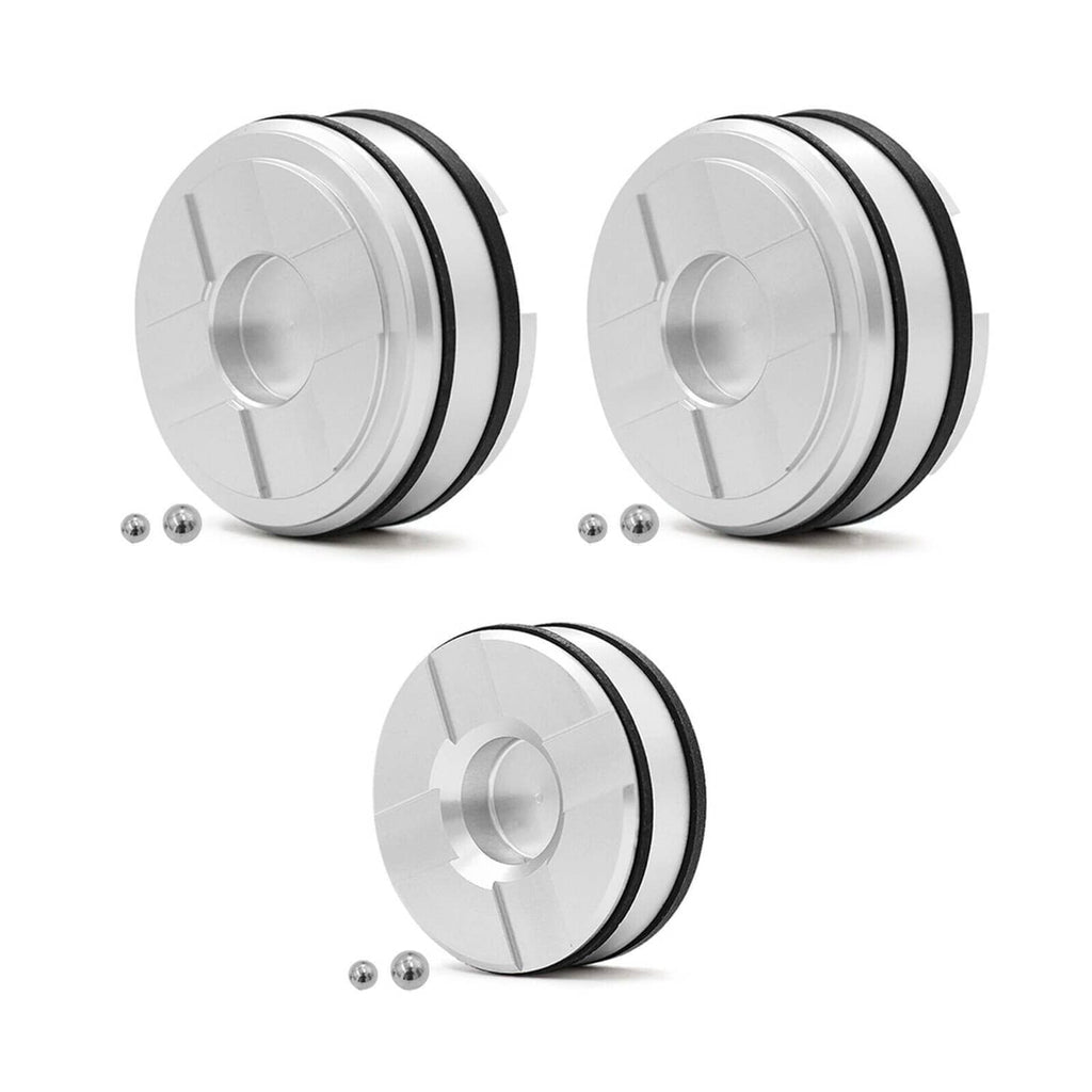 Pinless forward accumulator piston kit: silver piston assemblies with black sealing rings and balls