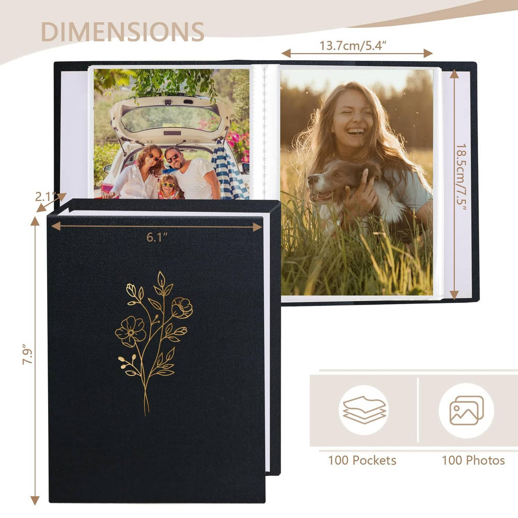 Open black photo album showing photo sleeves and booklet layout