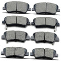Set of gray ceramic brake pads with black backing plates, metal mounting tabs