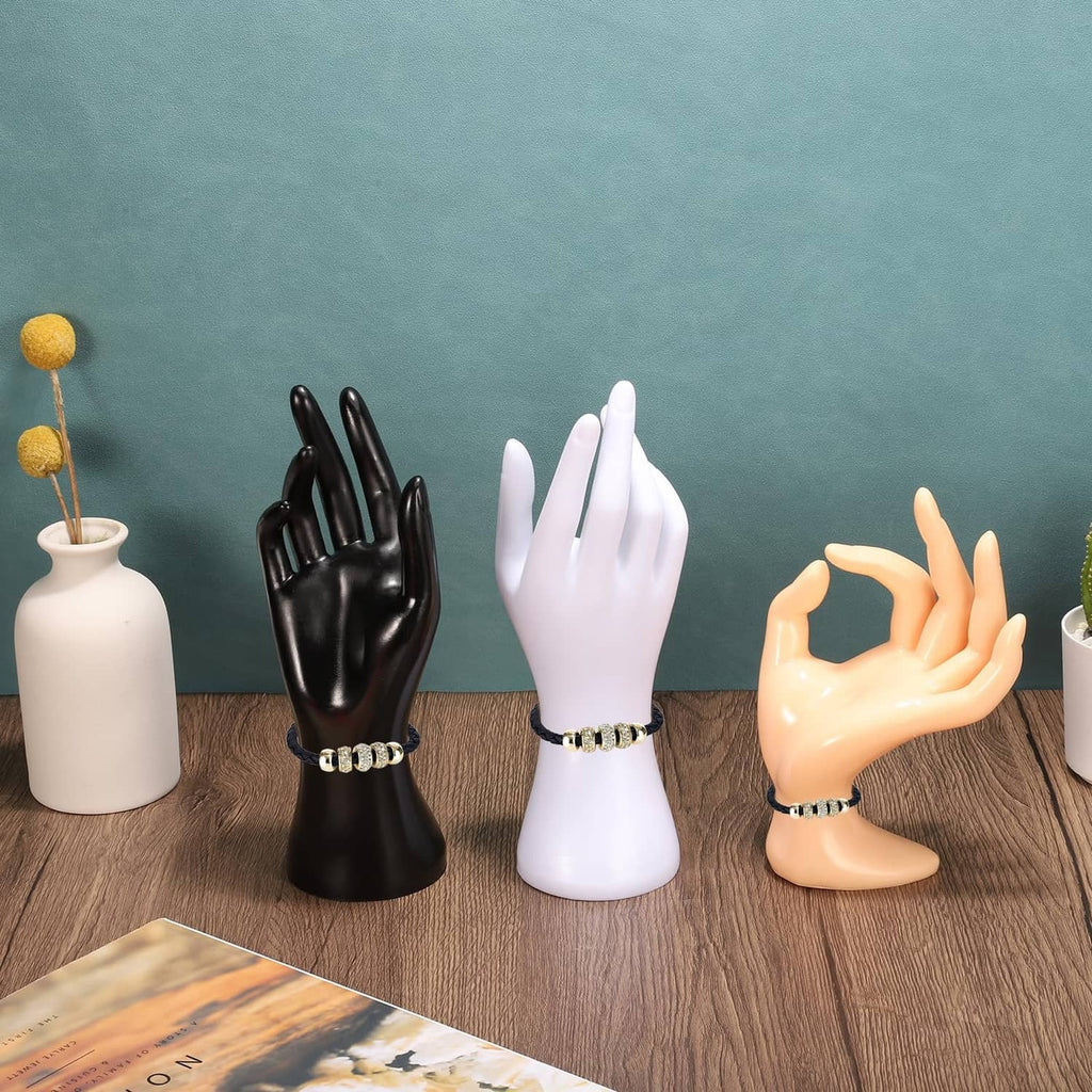 White plastic hand ring holder display stand on wrist base, ring slots