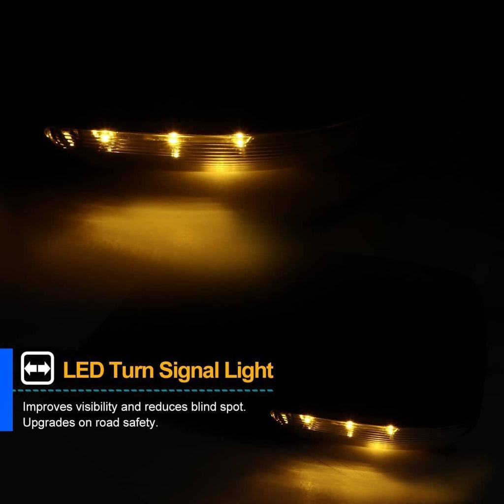 Left driver side mirror turn signal light showing glowing amber LED strip
