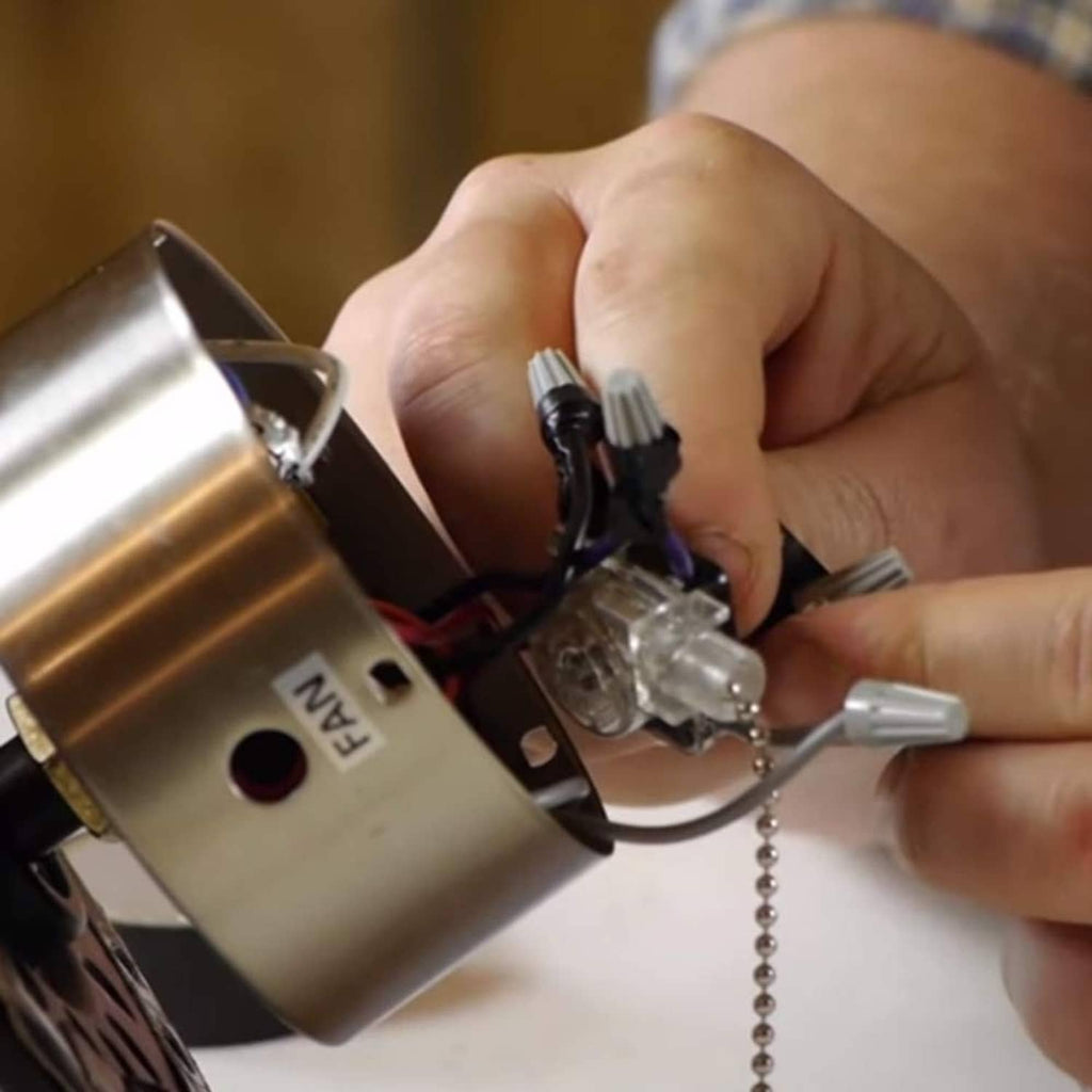 Ceiling fan pull chain switch wiring terminals inside clear plastic housing