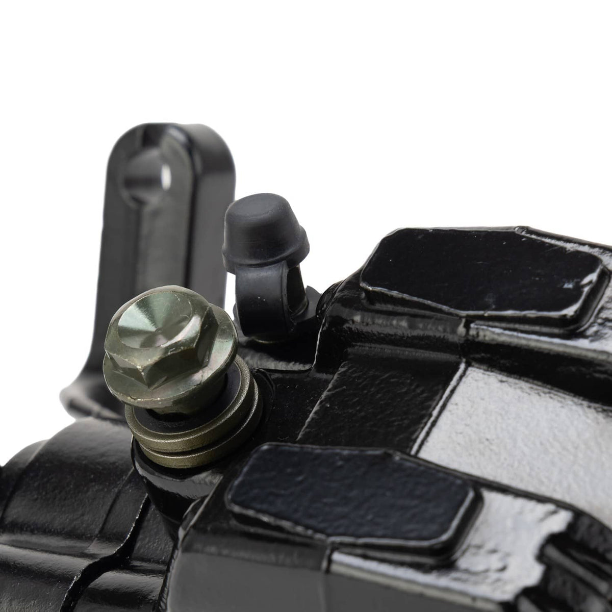 Rear brake caliper detail showing black housing texture, metal bolt heads, and lever pivot
