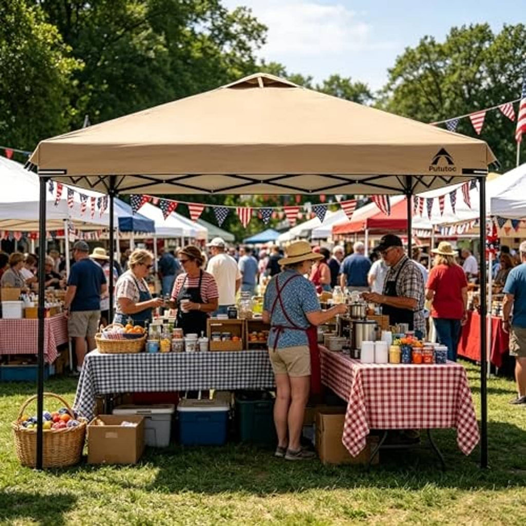 Khaki vented canopy top cover at an outdoor event over a vendor food table