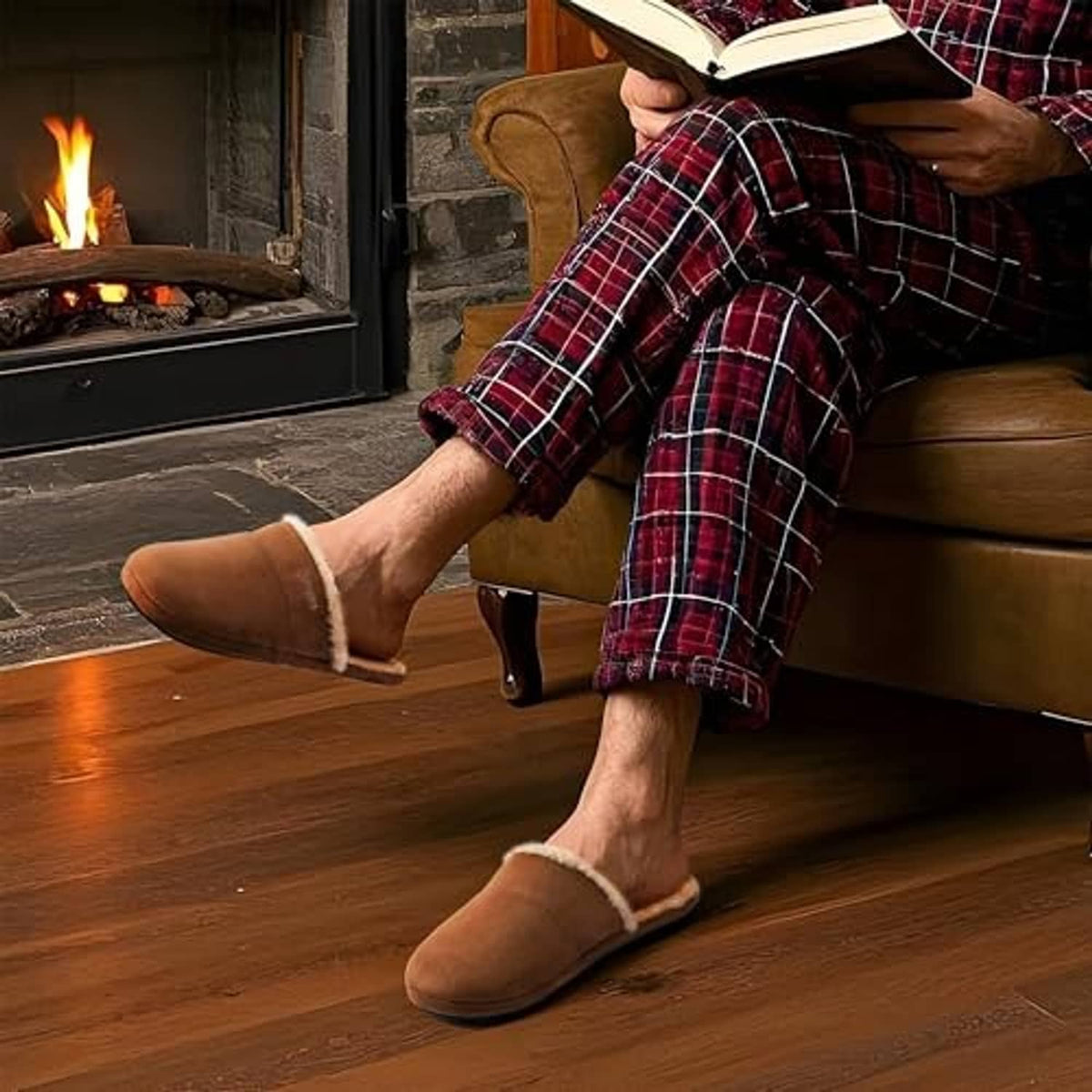 Tan fuzzy scuff house slippers worn on bare feet with cushioned lining