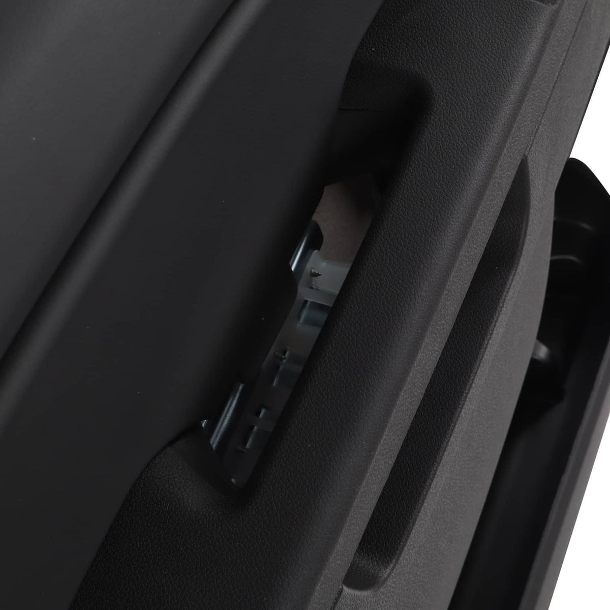 Black interior driver-side door trim panel with rectangular recess and tabs