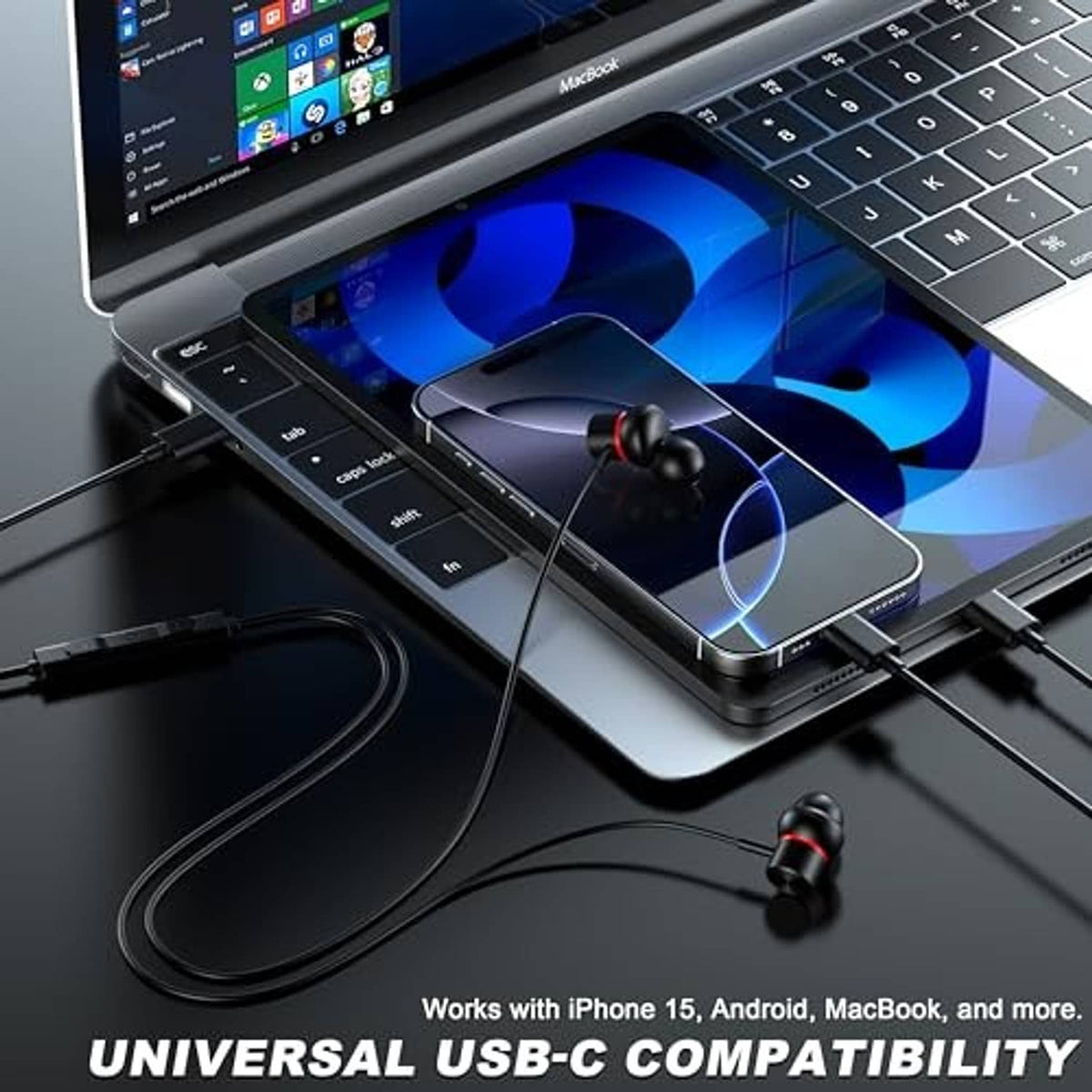 Black wired USB-C earbuds connected to a laptop, showing inline control cable