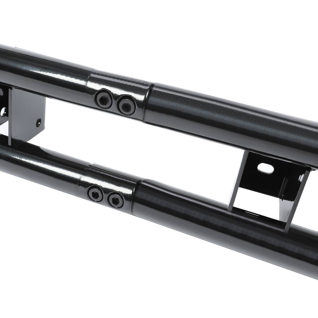 Close-up of black bumper bar with mounting holes, bolts, and rectangular hitch bracket