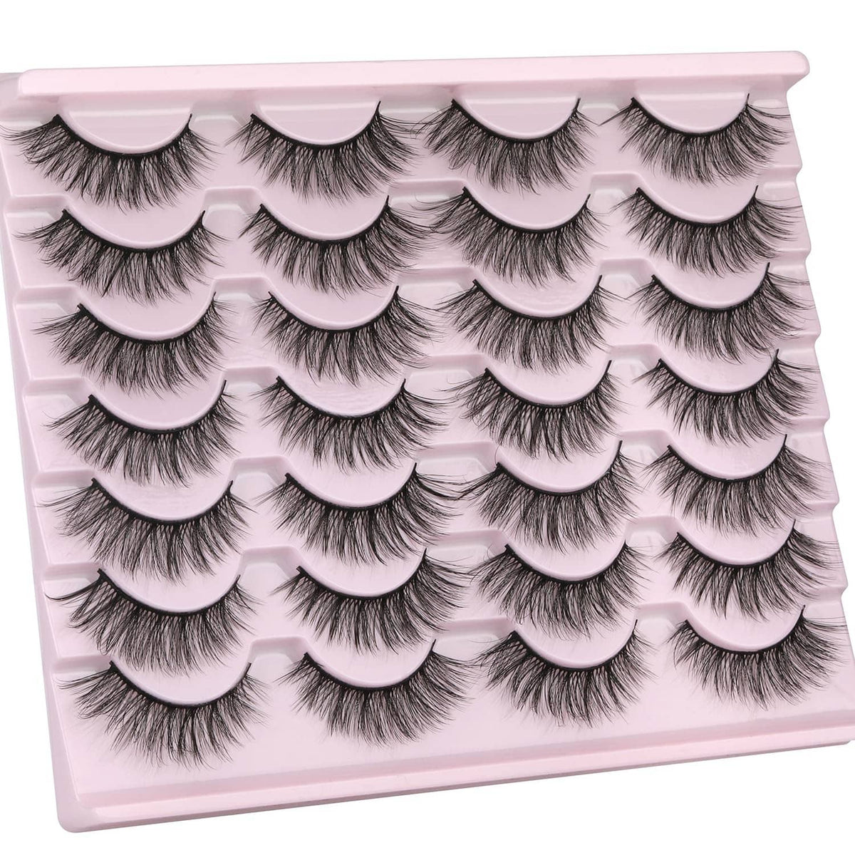 Black wispy faux mink false eyelashes, multiple curved pairs on tray
