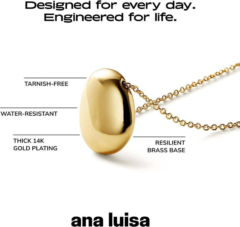 Gold-plated pebble pendant necklace, oval pendant shown from the side on a chain