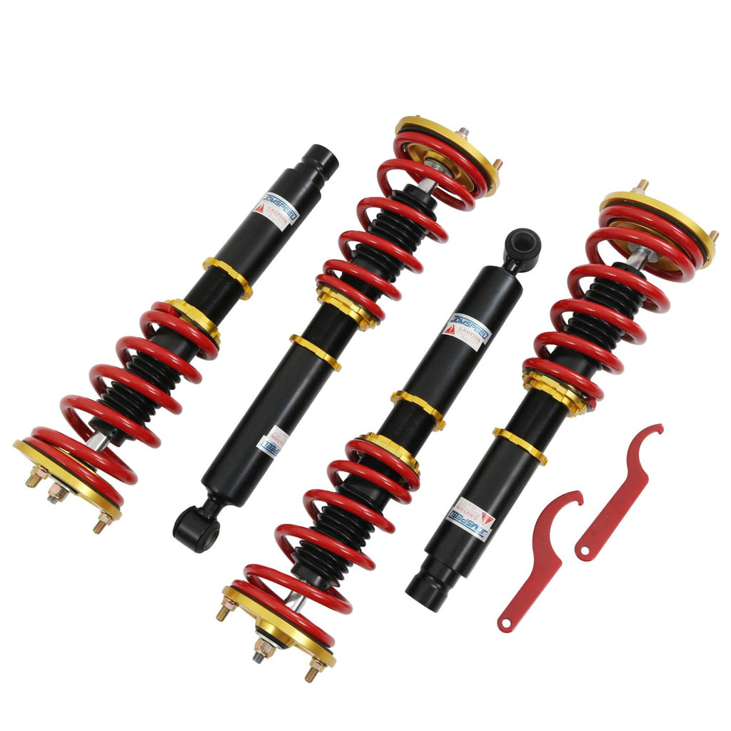 Four coilover shock struts with red springs, black bodies, and gold top mounting plates