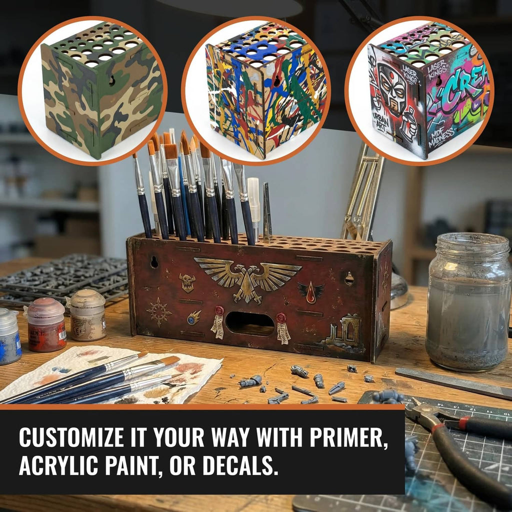 Wooden brush organizer with painted front panel holding paintbrushes on a worktable