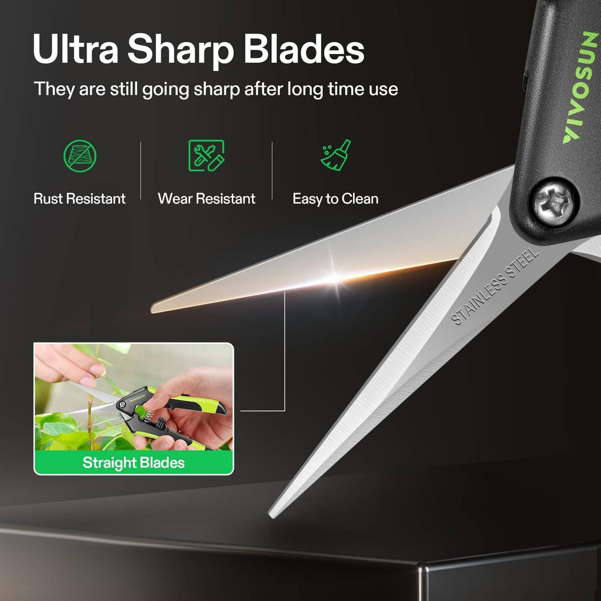 Close-up of stainless steel pruning scissors blades, green-and-black handle base