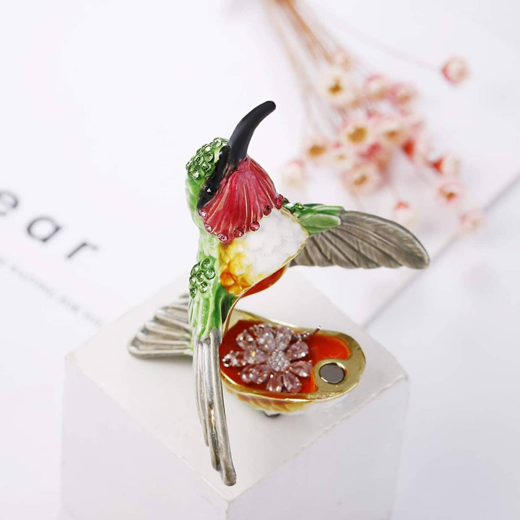 Hinged enamel hummingbird trinket box, green bird perched over open compartment