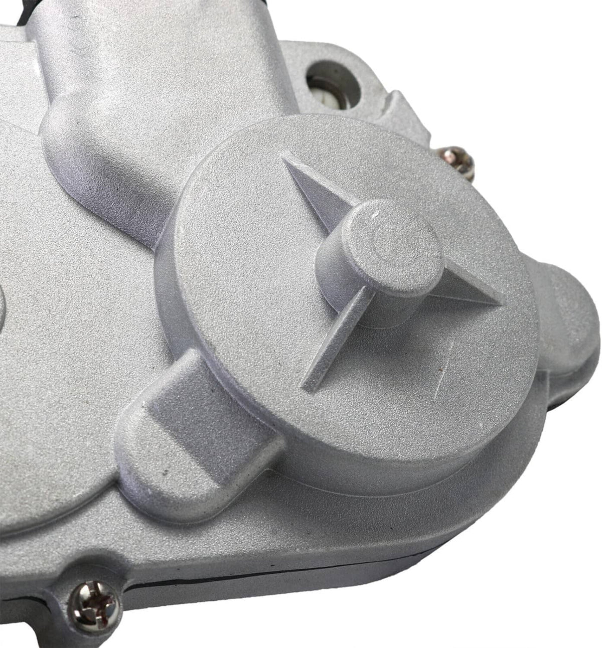 Transfer case shift actuator motor close-up of textured silver housing detail